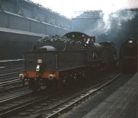 Ex-GWR 3440 <I>City of Truro</I> leads no 49 <I>Gordon Highlander</I> out of Glasgow Central on 19 September 1959, having arrived earlier with one of the many specials run in connection with the Scottish Industries Exhibition held in Glasgow during that month. The duo has just passed Stanier Pacific 46220 <I>Coronation</I> preparing to take out a WCML train for London Euston.<br><br>[A Snapper (Courtesy Bruce McCartney) 19/09/1959]