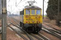 Freightliner 86609 runs south through the loops at Drem on 17 March 2011.<br><br>[Bill Roberton 17/03/2011]