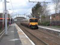 318 262 calls at Blantyre on 26 March with a service for Larkhall.  <br>
Uniquely for the SPT network the station building retains its <br>
Strathclyde Red branding, the image before last.<br>
<br><br>[David Panton 26/03/2011]