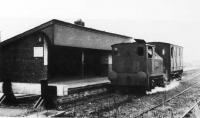 Shortly before final closure in 1957, Sentinel locomotive <I>Gradwell</I> stands at Grimsargh (CMHW) station with a single converted LNWR brakevan. Previously three of these vehicles had been required for the passenger services but one was sufficient towards the end. The Whittingham Hospital line was believed to be the only railway in the country where a Sentinel geared locomotive was regularly used to haul passenger services. <br><br>[David Hindle Collection //1957]