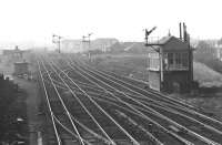 View west at Saughton Junction, seen  through a telephoto lens, late one afternoon in March 1972. The location was still a junction at that time and the signal box still operational, although the former carriage sidings beyond the box had gone and little remained of the old goods yard off to the left. As for Saughton station, opened in 1842 (as Corstorphine) and closed in 1921, nothing remains (other than the bricked-up entrance on Saughton Road). [See image 25903].<br>
<br><br>[Bill Jamieson /03/1972]