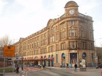 The main building at Manchester Victoria was dirty and run down for many years but it has been renovated and probably now looks like it did when it was the headquarters of the Lancashire and Yorkshire Railway. In particular the canopies at the front have been painstakingly restored [see image 33428]. The Metrolink tram services emerge from the <I>hole in the wall</I> that is just off picture to the right. <br><br>[Mark Bartlett 19/03/2011]