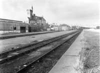 Scene at Fraserburgh on 3 November 1979, one month after the last freight left, with the deserted goods yard awaiting its fate. The goods van at the far right had been condemned a few years previously and would be scrapped along with the rest of the assets at the end of January 1980.<br><br>[John Williamson 03/11/1979]