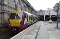 The 6-car 14.48 service to Helensburgh Central waits at Waverley platform 9 on 31 March 2011.<br><br>[Colin Miller 31/03/2011]