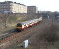 320 321 comes off the Springburn branch at Bellgrove Junction on 26 March 2011 with a Dalmuir service.<br><br>[David Panton 26/03/2011]