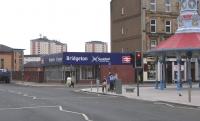 East End Style. The street entrance of Bridgeton (formerly Bridgeton <br>
Cross) station on 13 April 2011. At the cross is the 'Brigton Umbrella', of 1875 looking in fine shape, though without its original seating.<br><br>[David Panton 13/04/2011]