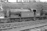 Gresley N2 0-6-2T no 69510 stands in the shed yard at Hawick in August 1957.<br><br>[A Snapper (Courtesy Bruce McCartney) 10/08/1957]