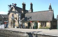 The classic old building on platform 2 at Grosmont station on Monday morning 20 April 2009, with the time on the station clock showing 10.30. The building stands at the entrance from Front Street alongside the level crossing.<br><br>[John Furnevel 20/04/2009]