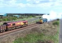 66105 with a freight meets Deltic no D9000/55022 <I>Royal Scots Grey</I>, currently on hire to GBRf, just west of Freemans Crossing, North Blyth, on 12 April 2011. [See image 33624]<br><br>[Colin Alexander 12/04/2011]