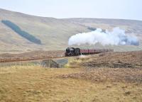 After a water stop at Achnasheen on 19 April, K4 no 61994 <I> The Great Marquess </I> nears the summit of thelong climb west from the station with<I> The Great Britain IV </I> special on its way to Kyle of Lochalsh.<br><br>[John Gray 19/04/2011]