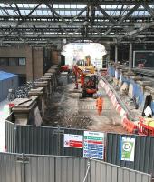 Ongoing work on the closed south ramp at Waverley station on 21 April 2011. View from the cross-station walkway looking towards the station exit on Waverley Bridge.<br><br>[John Furnevel 21/04/2011]