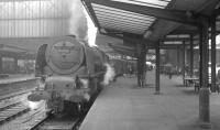 Stanier Pacific no 46248 <I>City of Leeds</I> off Crewe North shed stands at Carlisle platform 3 on 25 April 1964 shortly after bringing in the 9.25am Crewe - Perth. The locomotive is about to be relieved, following which it will make its way to Upperby shed.<br><br>[K A Gray 25/04/1964]