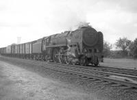 Britannia Pacific no 70011 <I>Hotspur</I> just south of Gretna Junction around 1963 with what is thought to be the Aberdeen - Manchester fish train.<br><br>[A Snapper (Courtesy Bruce McCartney) //1963]