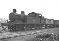 Stanier 2P 0-4-4T no 41908 stands on Buxton shed in May 1960 nearly 6 months after withdrawal. The locomotive was eventually cut up at Gorton works in the spring of 1961. <br><br>[K A Gray 20/05/1960]