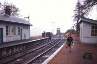 View towards Killin East Junction signal box at Easter 1966, with the main line to Callander to the right and the Killin branch dropping away to the left. Killin Junction was unusual in having no road access, with Table 33 of the BR timetable of the day referring to <I>'Killin Junction (Exchange Platform only)'</I>. When the photographer and his family walked across the moor to the junction during a holiday from Edinburgh, they found a scene reminiscent of the <I>Marie Celeste</I>. Everything appeared intact, with the station log book still open at the final entry before the landslip in Glen Ogle had permanently closed the line between Callander and Crianlarich on 27th September 1965.<br><br>[Frank Spaven Collection (Courtesy David Spaven) //1966]