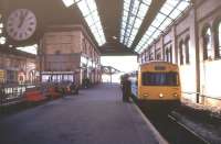 A terminating DMU service stands under the overall roof at platform 1 of Blackburn station in April 1995.<br><br>[Ian Dinmore /04/1995]