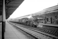 A photograph thought to have been taken in late February or early March 1967 at Aberystwyth, showing Standard Class 4 4-6-0 no 75033 with the down <I>Cambrian Coast Express</I> [see image 26171].  The last steam hauled CCE ran a short time later on 4 March 1967.<br><br>[Robin Barbour Collection (Courtesy Bruce McCartney) //1967]