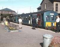 A DMU stands in the autumn sunshine at Mallaig with a BLS special on 1 September 1968. [See image 25028]<br><br>[Bruce McCartney 01/09/1968]