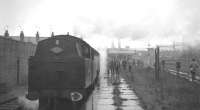 The MRTS <I>Three Counties Special</I> stands in the rain at Bacup on Saturday 26 November 1966 behind Stanier 2-6-4T no 42644. The locomotive had brought the train from Manchester Victoria and was preparing to take it on to Bury Bolton Street, where it would hand over to 47202+47383. [See image 28968] <br><br>[K A Gray 26/11/1966]