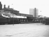 Black 5 no 44910 simmers alongside the platform at the west end of Manchester Victoria station on a quiet afternoon in July 1968.<br><br>[Jim Peebles /07/1968]