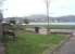 Campbeltown Loch, as seen from the bottom of the old railway cutting where the narrow gauge tracks emerged onto reclaimed land and turned left towards Hall St and the quayside, following the line of the footpath that can be seen here. New Quay, which also had railway tracks on it, can be seen in the left background. [See image 33469] for a map showing the railway layout in 1921. <br><br>[Mark Bartlett 26/03/2011]