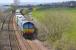 DRS 66423 with the 4A13 Grangemouth - Aberdeen intermodal, seen on 8 April near the site of the former Magdalen Green station on the western approach to Dundee.<br><br>[Bill Roberton 08/04/2011]