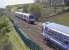 158 733 and 170424 pass near the former connection to Seafield Colliery, Kirkcaldy, on 11 April 2011.<br><br>[Bill Roberton 11/04/2011]