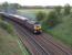 47786 with the Compass Tours <I>Mersey, Forth & Tay Circular</I> heading north 25 minutes late at Kirkforthar, near Markinch, Fife, on 13 April en route to Dundee.<br><br>[Brian Forbes 13/04/2011]