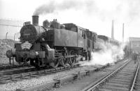 USA 0-6-0 tanks 30064+30069 at Fawley on 9 April 1967 with the LCGB Hampshire Branch Lines Rail Tour. The pair had taken over the special from 34057 at Southampton Central. <br><br>[Robin Barbour collection (Courtesy Bruce McCartney) 09/04/1967]