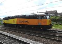 Colas Rail's 47739 passes Coatbridge Central on 0Z47 Hamilton to Cadder Yard return LE working on 11 May after delivering wagons for repair to the E G Steele depot. This is one of several such trips made by the locomotive that day.<br><br>[Ken Browne 11/05/2011]