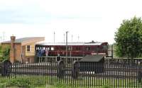 Restored GWR steam railmotor no 93 in operation at the Great Western Society depot at Didcot on 17 May 2011. Photographed from the platform at Didcot Station.<br>
<br><br>[Peter Todd 17/05/2011]