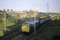 A special seaside excursion to Clacton is seen approaching Hythe station in Colchester on its evening return journey behind 31 145. Whether it was an Adex or Mystex is not known, but those on board had been very lucky with the weather that day, 1st September 1977.<br><br>[Mark Dufton 01/09/1977]