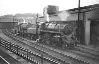 BR Standard class 2 no 76074 and J37 0-6-0 no 64539 stand together in the shed yard at Hawick on 19 July 1958.<br><br>[A Snapper (Courtesy Bruce McCartney) 19/07/1958]