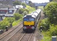 57001 hauls <I>'The Royal Scotsman'</I> north through Cowdenbeath on 23 May 2011. The train is crossing a bridge that once spanned a mineral line serving nos 7 and No 8 pits.<br>
<br><br>[Bill Roberton 23/05/2011]