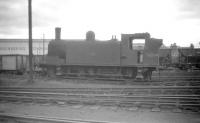 McIntosh 3F 0-6-0T no 56264 in the shed yard at Motherwell in July 1959. The locomotive was officially withdrawn from here the following October and cut up at Inverurie works the same month.<br><br>[Robin Barbour Collection (Courtesy Bruce McCartney) 29/07/1959]