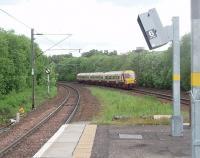 View from the west end of the Hyndland island platform on 25 May as EMU 334002 runs in on a service for Larkhall. <br><br>[Mark Bartlett 25/05/2011]