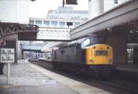 A Class 40 locomotive stands alongside the platform at Aberdeen station in April 1979.<br><br>[Ian Dinmore 16/04/1979]