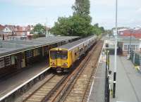 Hoylake, penultimate stop on the West Kirby branch, has notable Art Deco station buildings. The line enjoys a fifteen minute service frequency and Merseyrail EMU 508141 is seen here calling on 11 June 2011 with a Liverpool bound service.<br><br>[Mark Bartlett 11/06/2011]