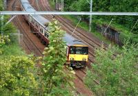 Westbound 318 251 approaching Uddingston on the evening of 9th June 2011.<br>
<br><br>[John Steven 09/06/2011]