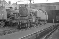 Stanier 2-6-4T no 42634 receiving attention in the shed yard at Lostock Hall on 25 September 1960. Classmate 42434 stands on the left with Fairburn 42286 at the rear of the group.<br><br>[K A Gray 25/09/1960]