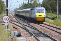 View east from Prestonpans station as the 10.00 East Coast 'Northern Lights' HST from Kings Cross to Aberdeen approaches on 20 June 2011.<br>
<br><br>[Bill Roberton 20/06/2011]