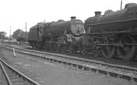 Sunday 27 August 1967 on Kingmoor shed. Face to face in the the north yard are Black 5s 45038 and 44674. The Britannia in the background is 70038 <i>Robin Hood</i> which had been officially withdrawn by BR a couple of weeks earlier. <br><br>[Bill Jamieson 27/08/1967]