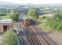 A short working from Inverness to Aviemore, formed by 158723, passes through the remains of Culloden Moor station and on to the single line section over the viaduct.  The train will immediately return as a morning commuter service to Inverness.<br><br>[Mark Bartlett 01/07/2011]