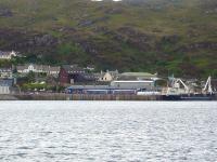 158706 unloads passengers at Kyle of Lochalsh on 22 June, following arrival at 11.28 with the service from Inverness. Photographed from the former Kyleakin ferry slipway. <br><br>[David Pesterfield 22/06/2011]
