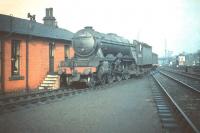 View east towards Waverley from alongside Haymarket shed on 28 March 1959. The signal box in the right background on the south side of the E&G main line is Haymarket Central Junction. The locomotive featured is Gresley A3 Pacific no 60040 <I>'Cameronian'</I>.  <br><br>[A Snapper (Courtesy Bruce McCartney) 28/03/1959]