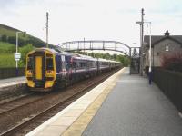 158736 trailing Turbostar 170409 pulls away from the northbound platform at Blair Atholl on 22 June 2011 with the 17.59 departure to Inverness. <br><br>[David Pesterfield 22/06/2011]