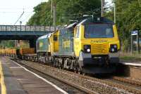 A Freightliner hauled Network Rail engineers train passes south <br>
through Leyland on 11 July 2011 with 70005 leading and dead 66511 tucked inside. <br>
<br><br>[John McIntyre 11/07/2011]