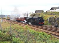 The much reduced station at Mallaig on 13 July 2011. 156485 has just arrived from Fort William and Black 5 45231 wreathes the station (and observers) in smoke as it departs with the return working of 'The Jacobite'.<br>
<br><br>[John Gray 13/07/2011]