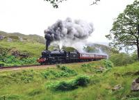 On Wednesdays, Thursdays and Fridays until the end of August there are two steam hauled excursions on the Mallaig extension. Here we see 44871 hammering up the 1 in 48 Beasdale Bank with the second train of the day. The headboard reads <I>'The Cambrian'</I> for reasons unknown.<br><br>[John Gray 14/07/2011]