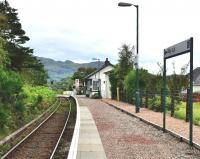 A view of Morar looking south towards the level crossing on 14 July 2011 [see image 47771]. The station building was being used by the local newspaper. Hopefully the weedkiller train is due to visit soon.<br>
<br><br>[John Gray 14/07/2011]